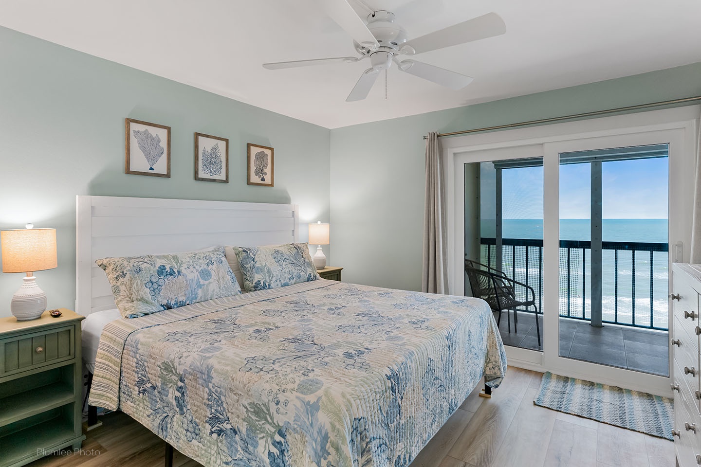 Master bedroom has water view and slider to balcony