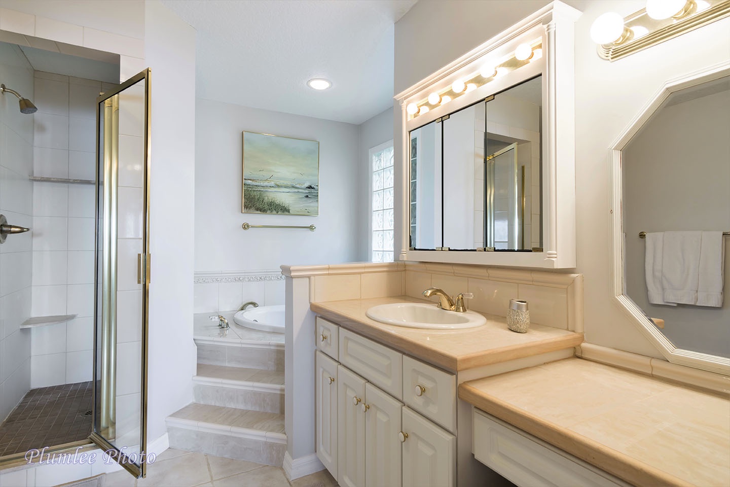 The huge master bathroom is a great place to relax.