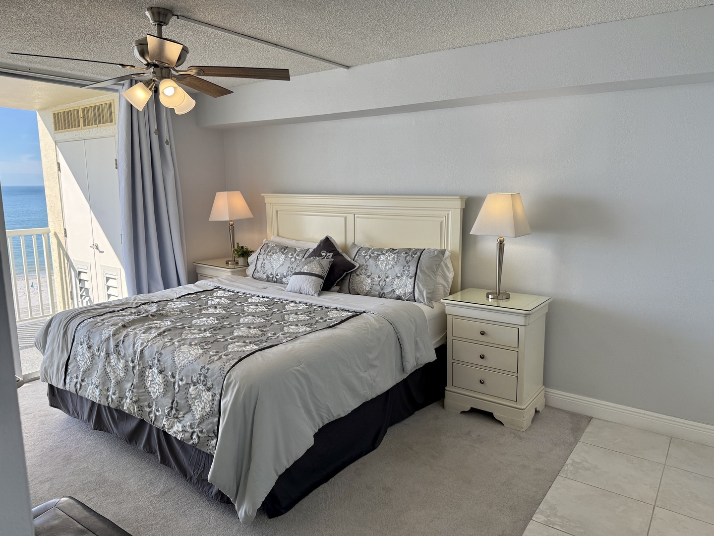 Wake up to breathtaking ocean views from your beautifully appointed bedroom, complete with elegant furnishings and a private balcony overlooking the sea.