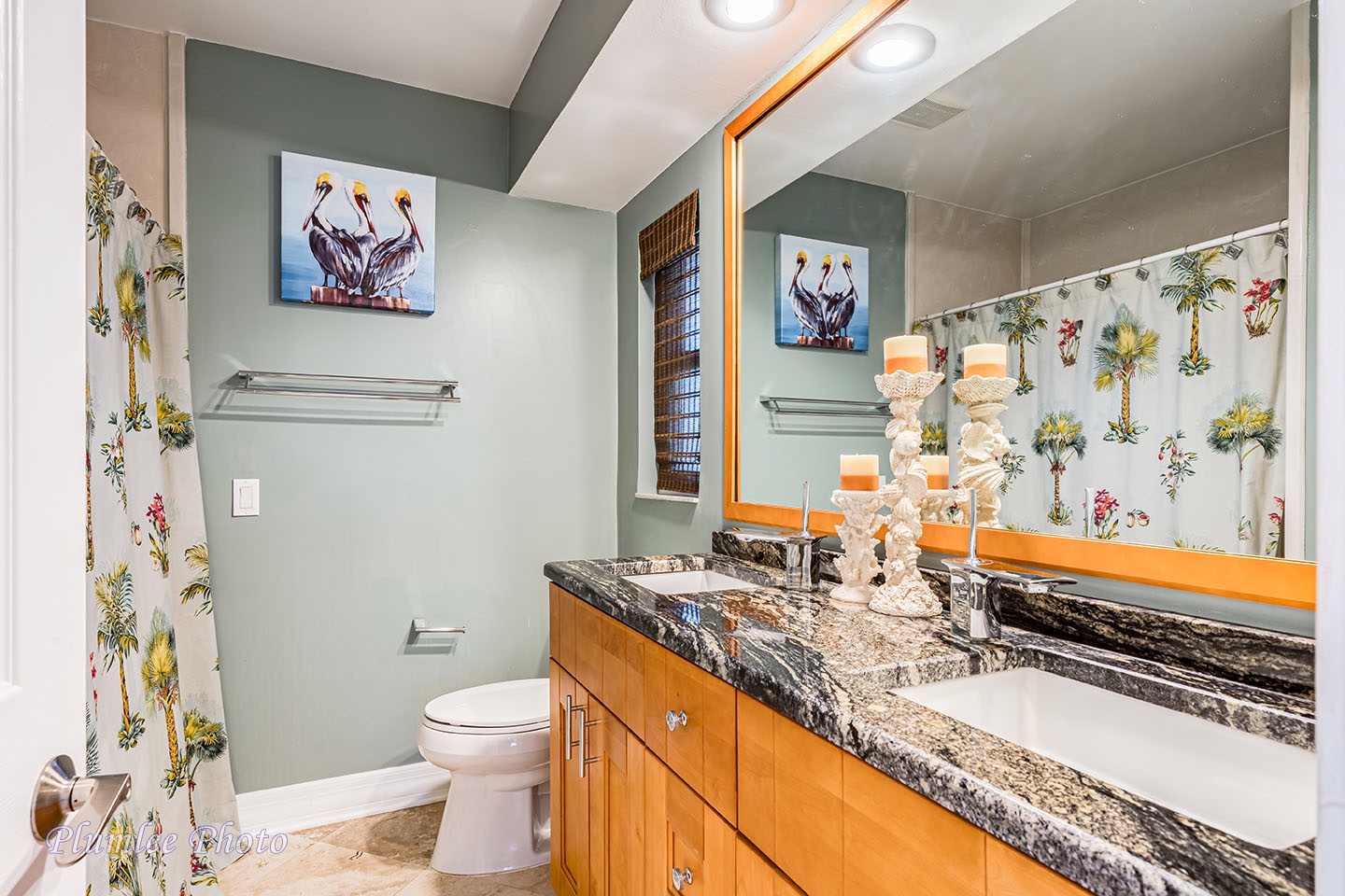 Hallway bathroom with double sinks