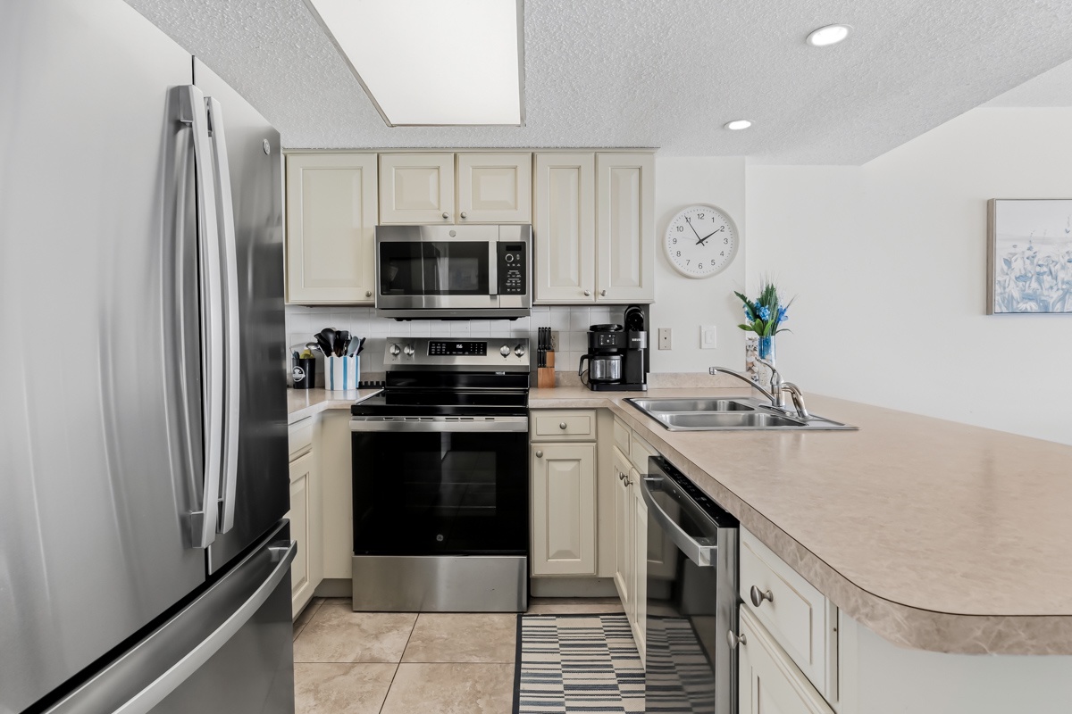 Your fully-equipped kitchen makes meal prep easy with stainless appliances, ample counter space, and everything you need to feel right at home.
