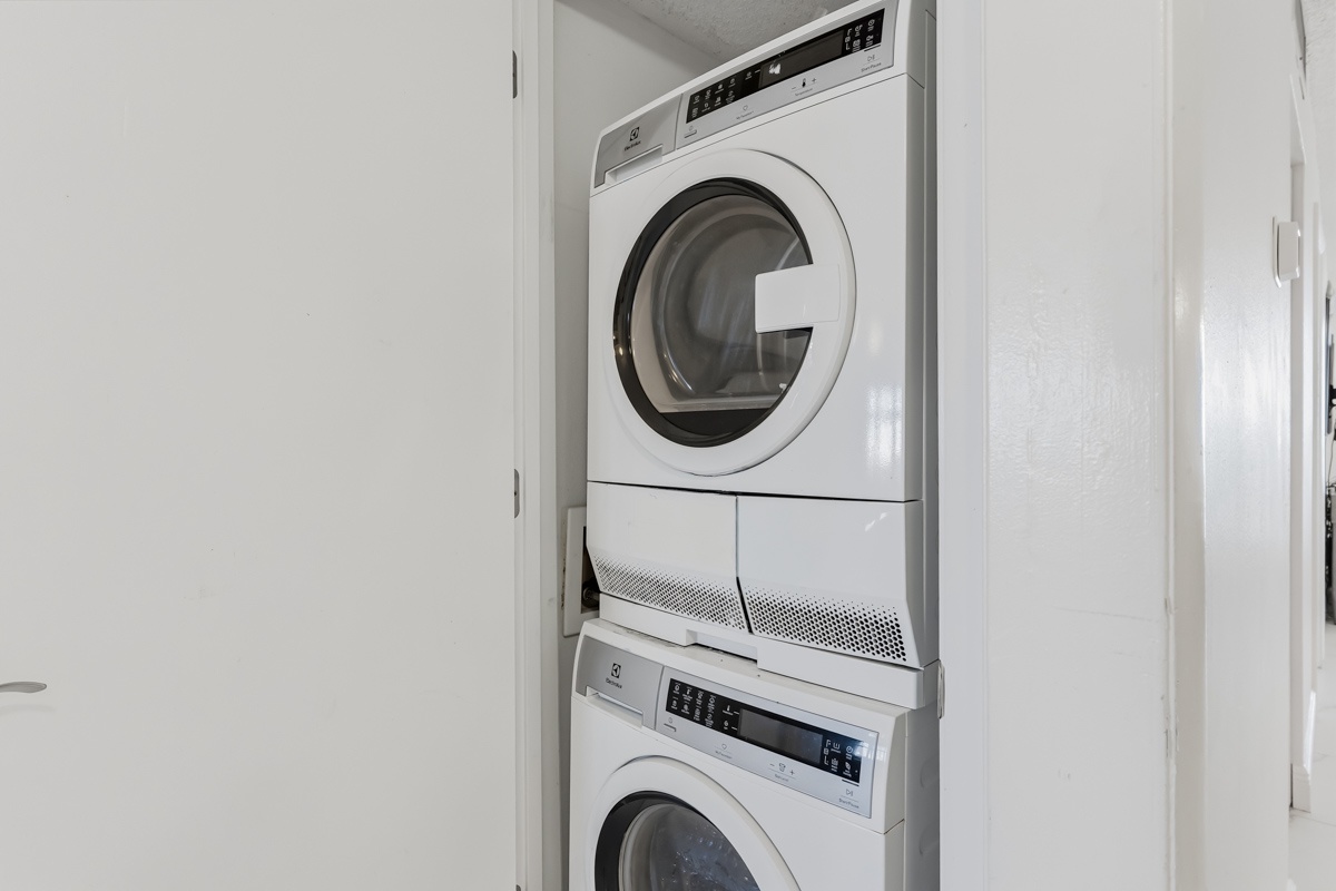 Your in-unit laundry closet makes packing light effortless—fresh clothes ready whenever you need them during your stay.