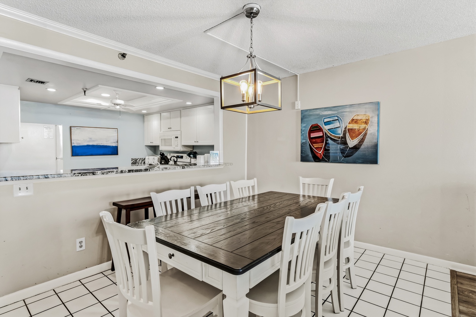 Gather around your spacious dining table for meals and memories, perfectly positioned next to the modern kitchen for easy entertaining.