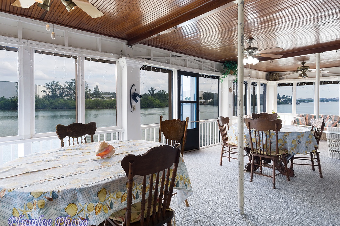 2nd Floor.  The Dining Area in the Sunroom has 2 tables.
