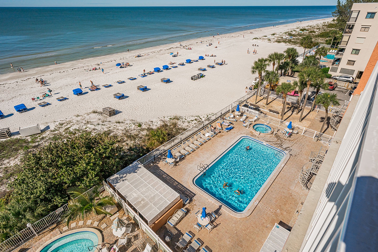 View of pool and deck from balcony