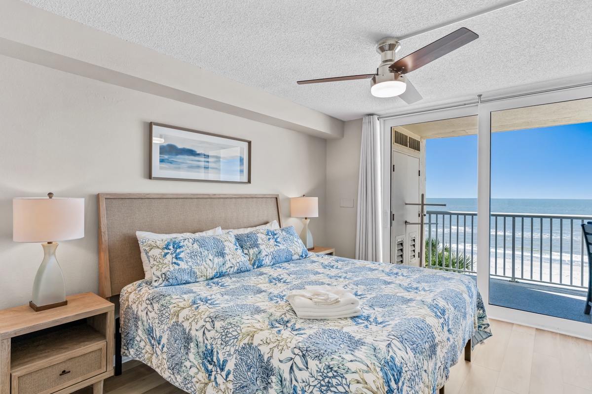 Wake up to stunning ocean views in this serene bedroom, where coastal-inspired bedding and gentle sea breezes create your perfect beachfront retreat.