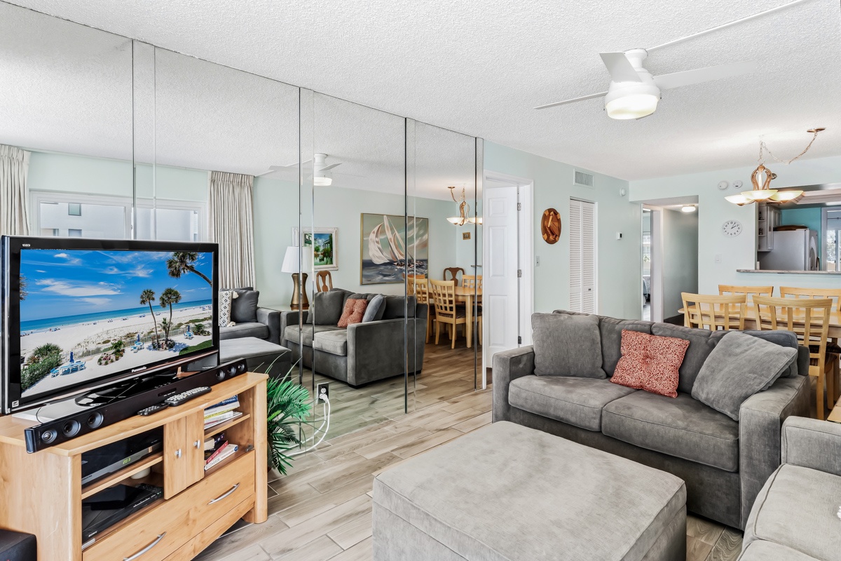 Sink into plush seating in your open-concept living space, where coastal-inspired décor and breezy colors invite you to unwind after a day of adventure.