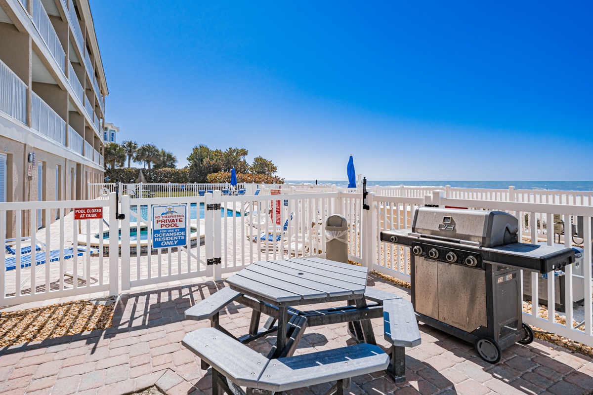 Picnic table and grill area beach side