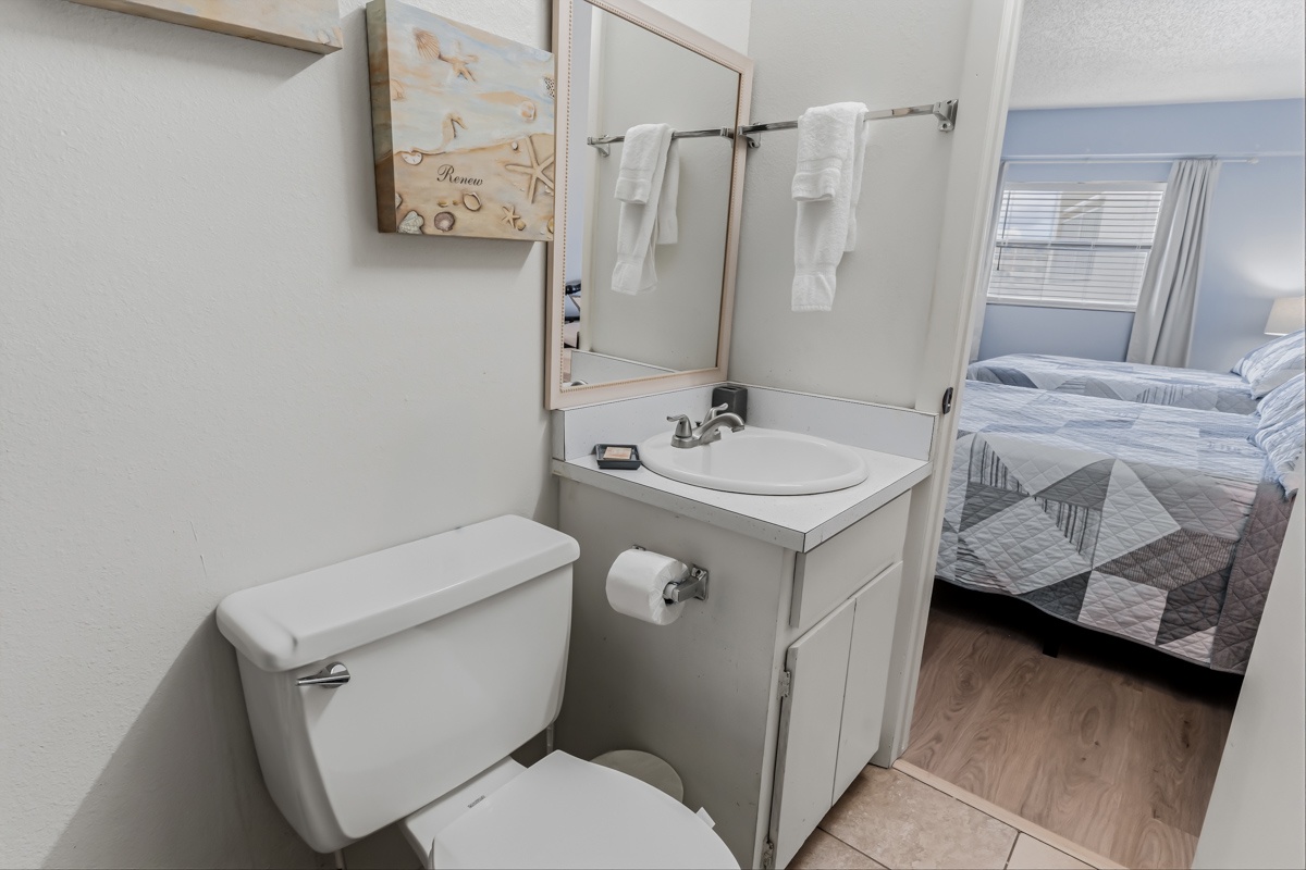 Your private ensuite bathroom offers fresh towels and essential conveniences just steps from your cozy bedroom.