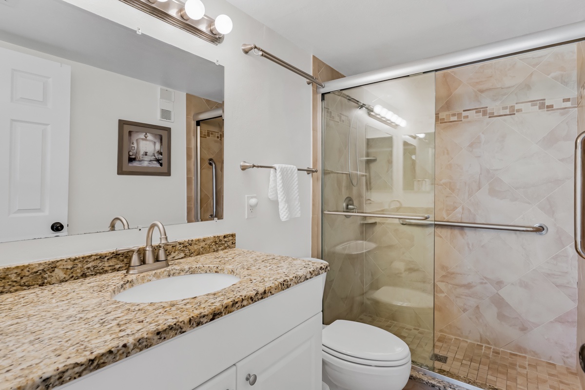 Primary ensuite bathroom with step-in shower