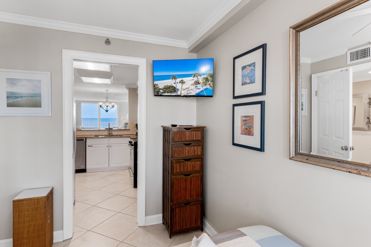 3rd bedroom has pocket door to kitchen and smart TV