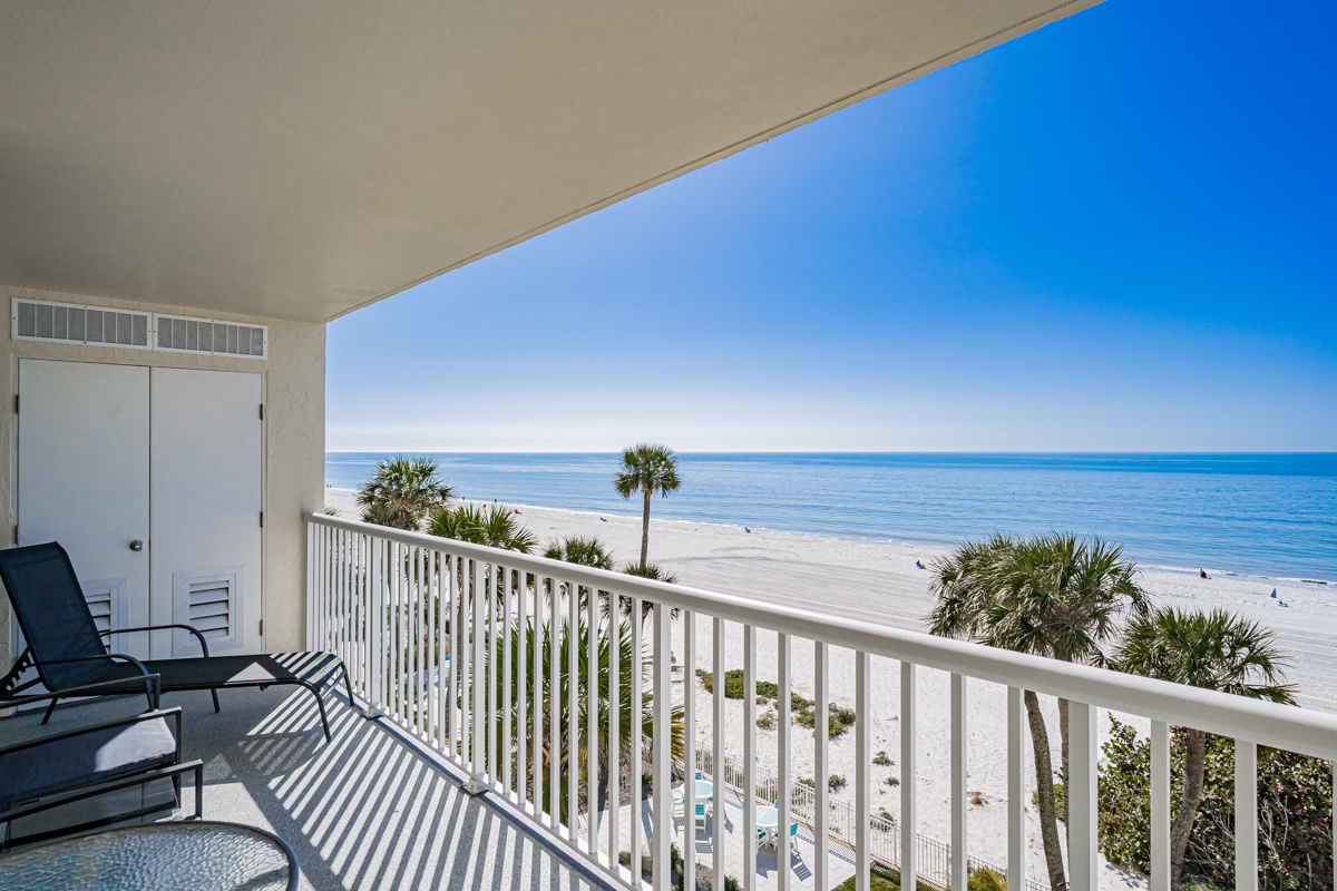 Sip your morning coffee on your private balcony while watching the waves roll in across pristine white sand.