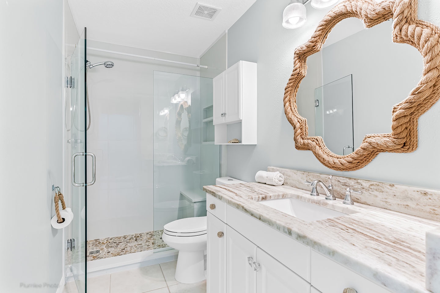 hallway bathroom has step in shower