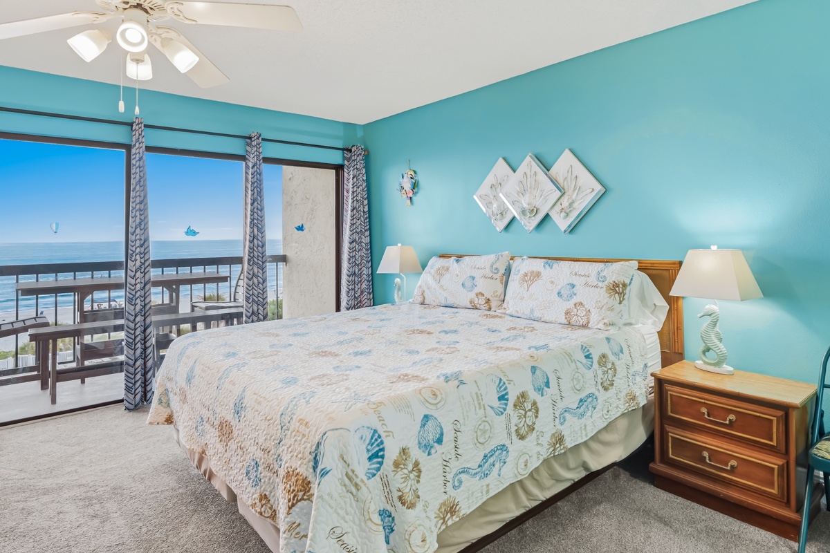 Wake up to endless ocean views from your coastal-inspired bedroom, where calming turquoise walls and soft sea-themed linens invite your perfect beach getaway.