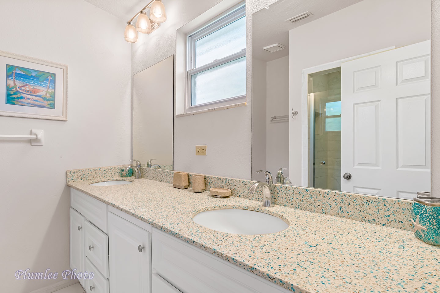 The Master Bath vanity area has a large counter top.