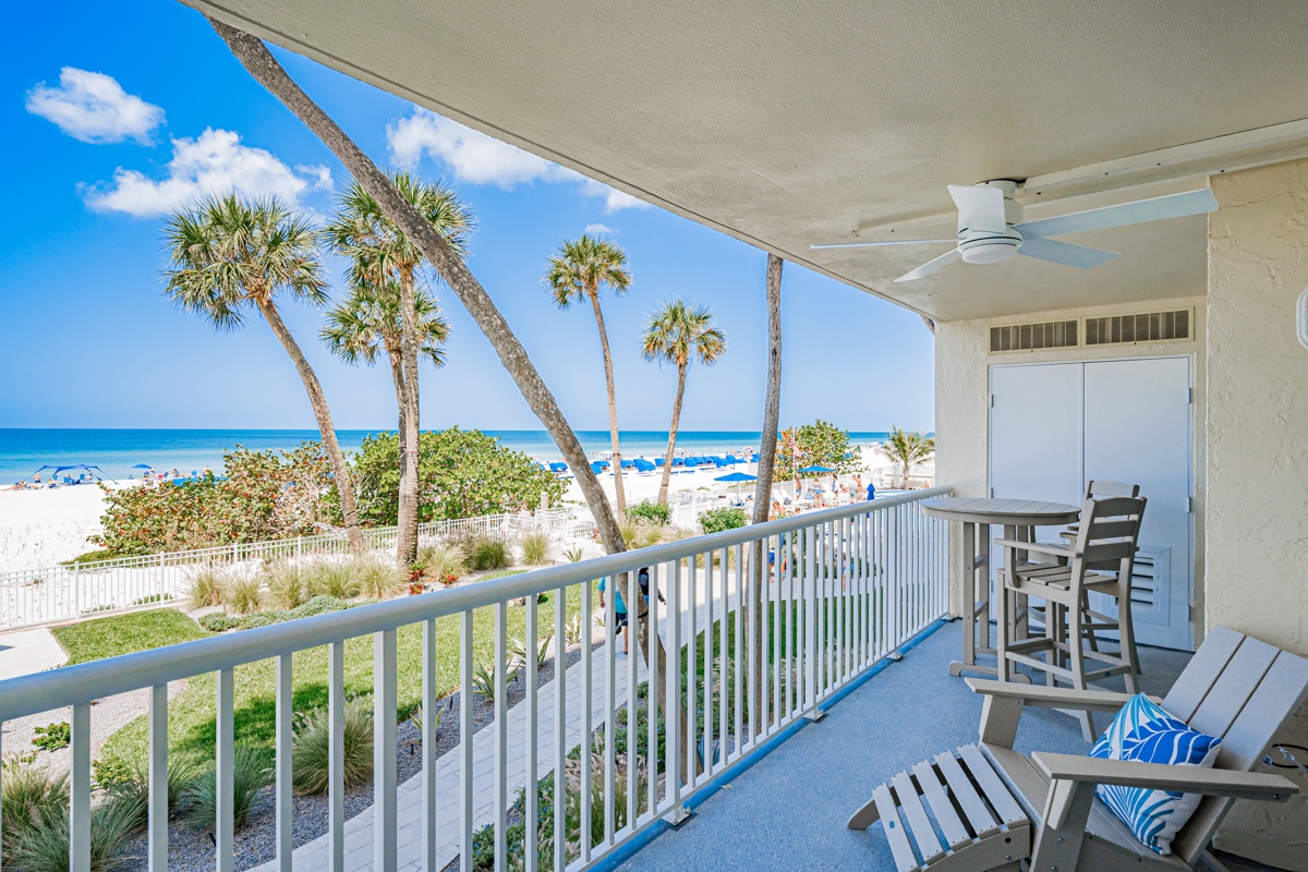 Your private beachfront balcony offers stunning ocean views with comfortable seating where you can unwind and watch the waves.