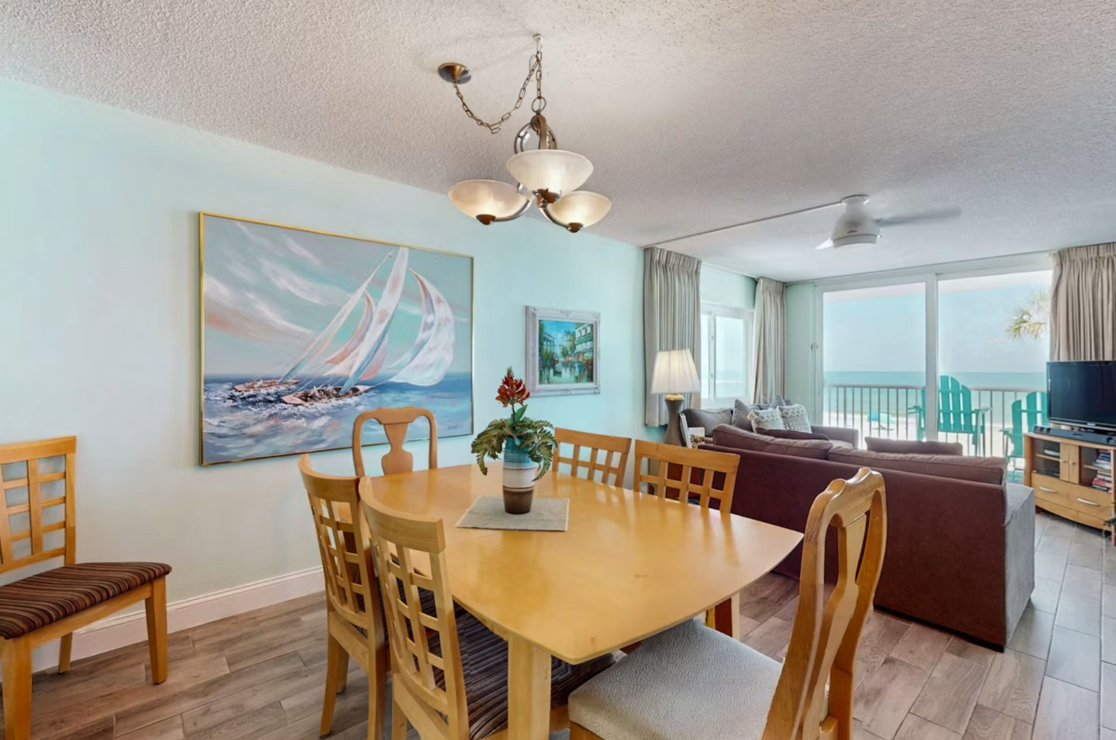 Picture yourself dining with stunning sea views just beyond your balcony—this bright, coastal-inspired space invites you to relax and savor every moment of your beach getaway.
