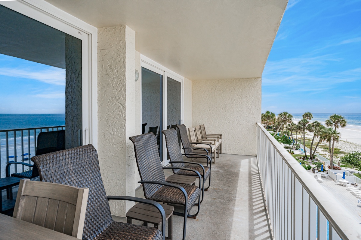 Your spacious balcony offers front-row seats to breathtaking ocean and beach views, with comfortable seating perfect for morning coffee or evening sunsets. Palm trees sway below as you take in the coastal breeze.