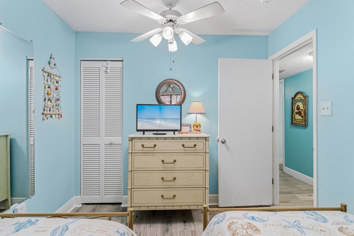 3rd bedroom has TV and ceiling fan as well