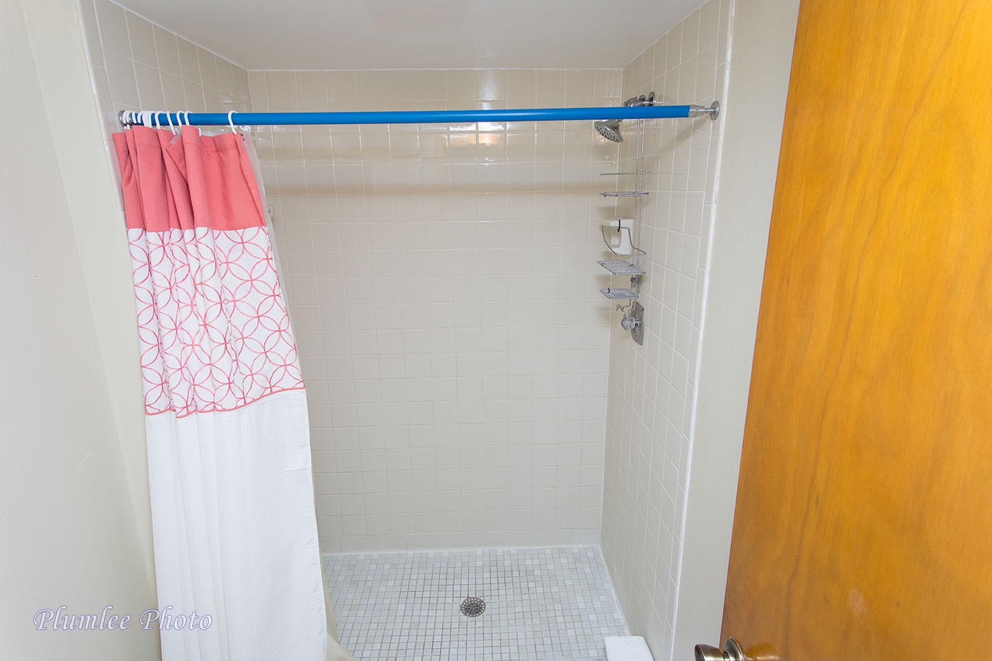 A step in shower is helpful for people with mobility issues.