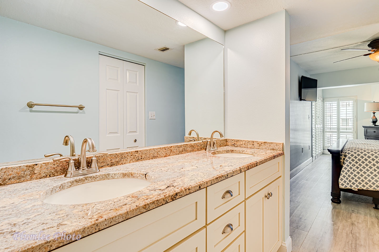 Ensuite master bathroom has double sinks.