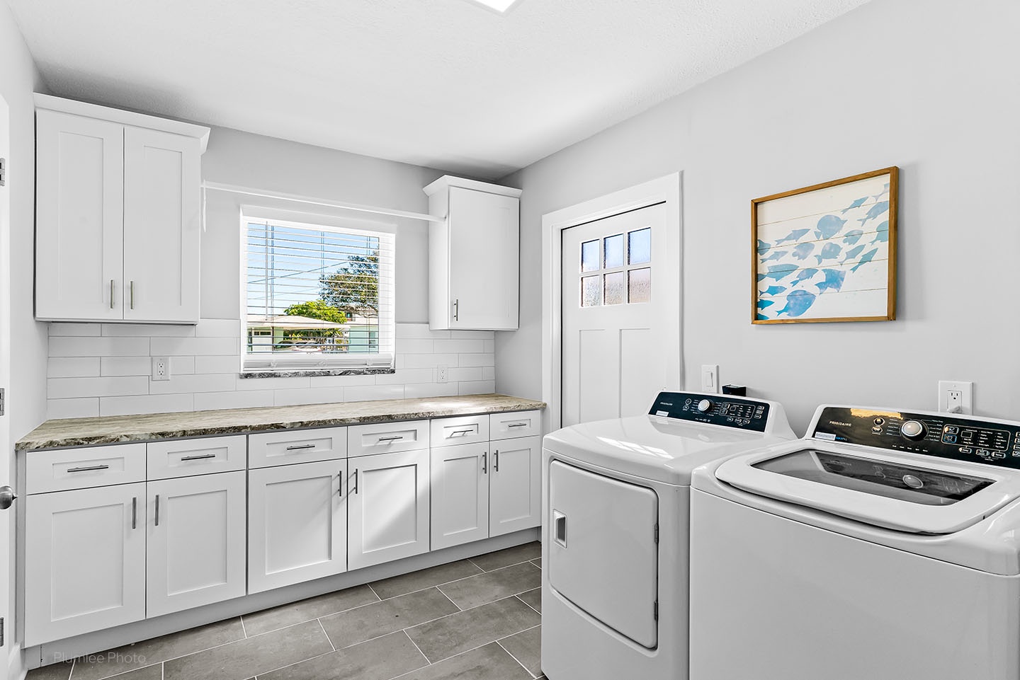 Fabulous utility room with free washer and dryer in house