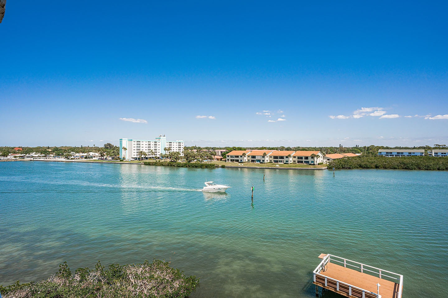 Watch the boats go by on the Intracoastal Waterway.