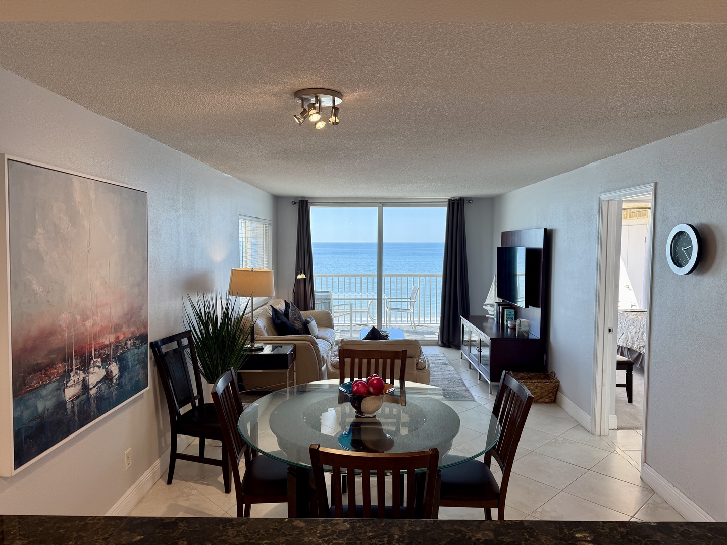 Unwind in your stylish oceanfront retreat, where sweeping sea views through floor-to-ceiling windows create the perfect backdrop for memorable meals and relaxing evenings.