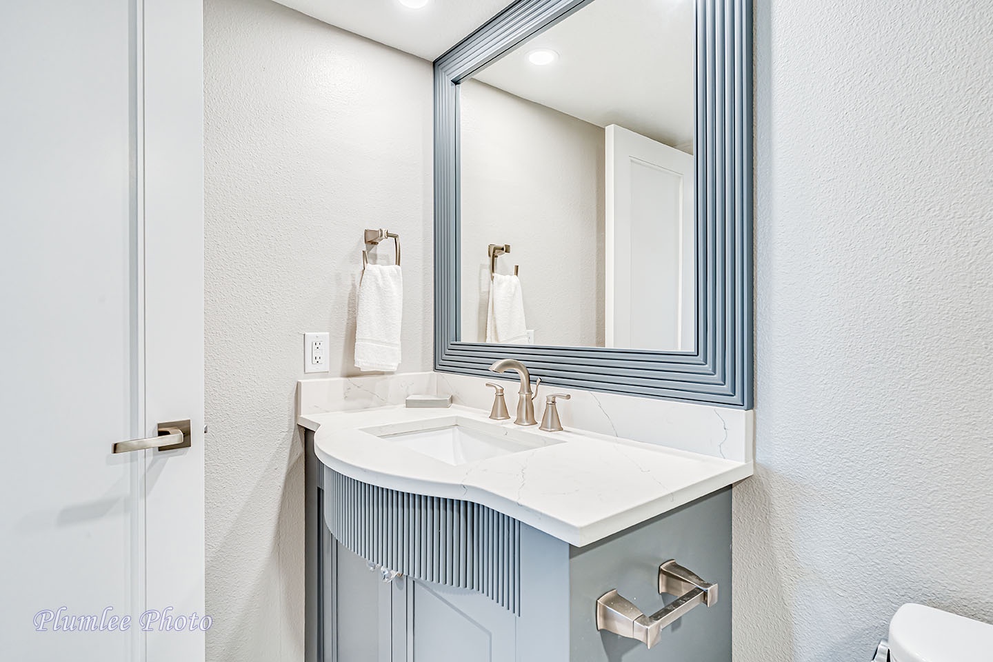 Hall bathroom vanity area.