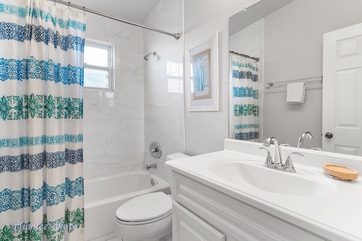 The Hallway Bath has a tub and shower combo.