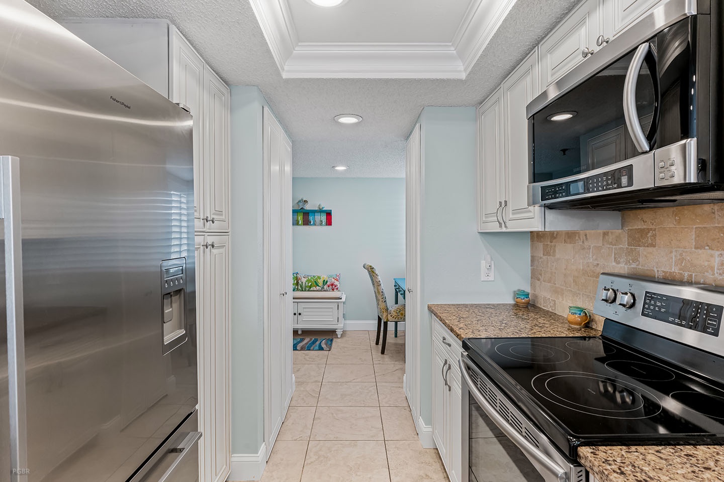 Looking from the kitchen to a bonus room.