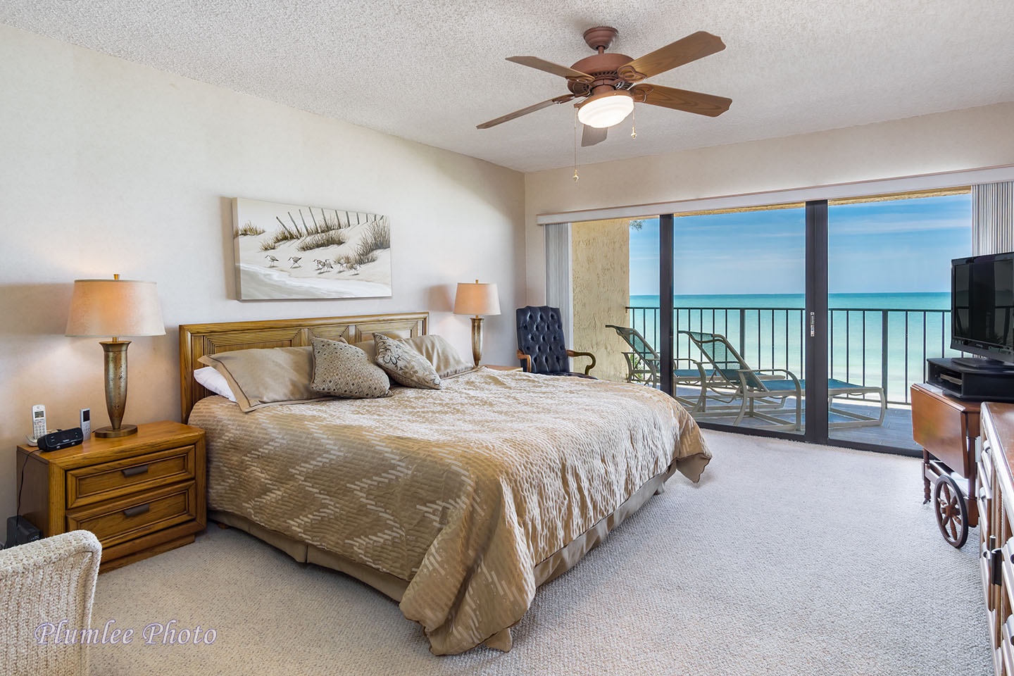 Master Bedroom with spectacular view of blues skies and water.