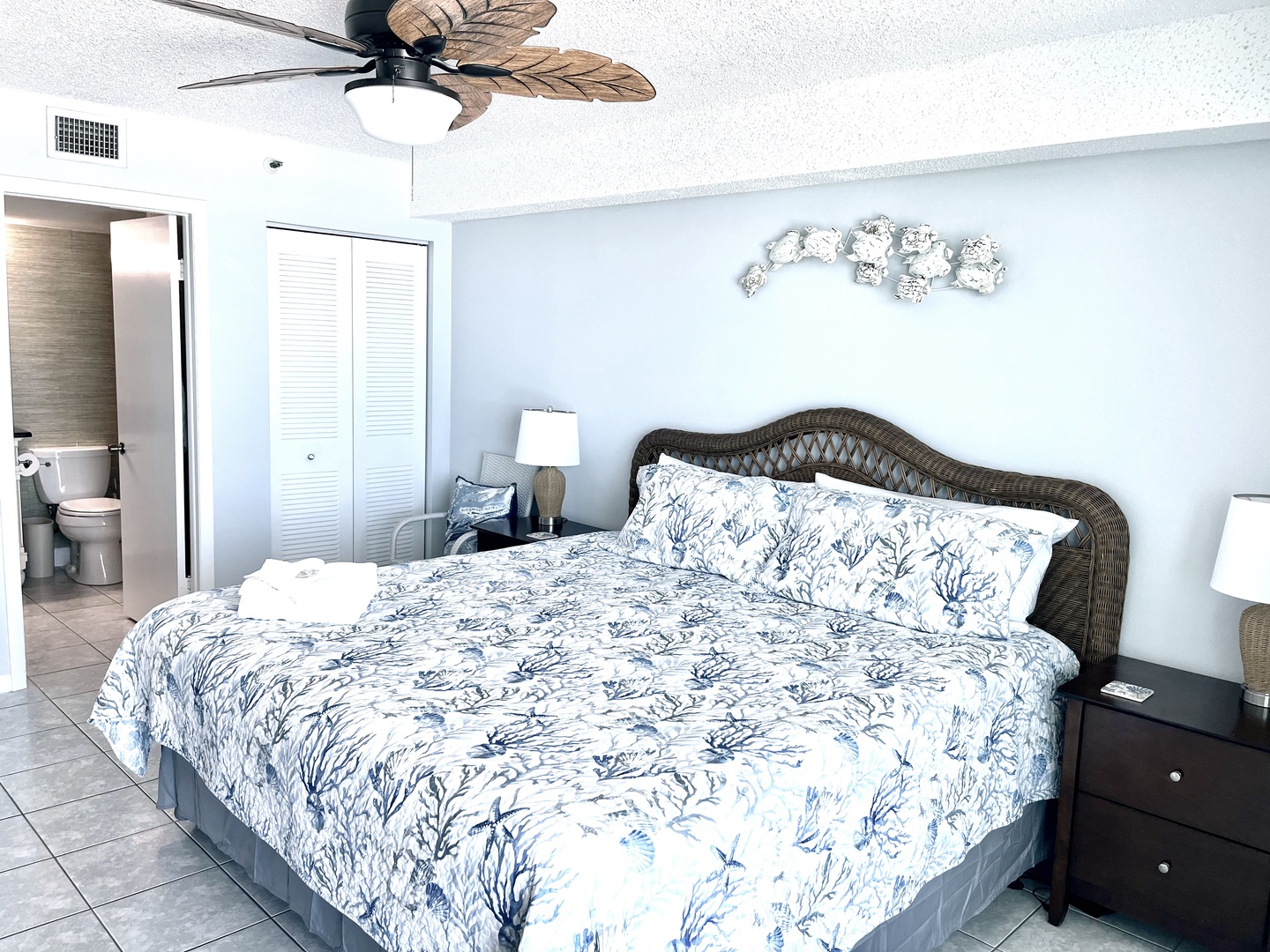 Primary King bed with ceiling fan