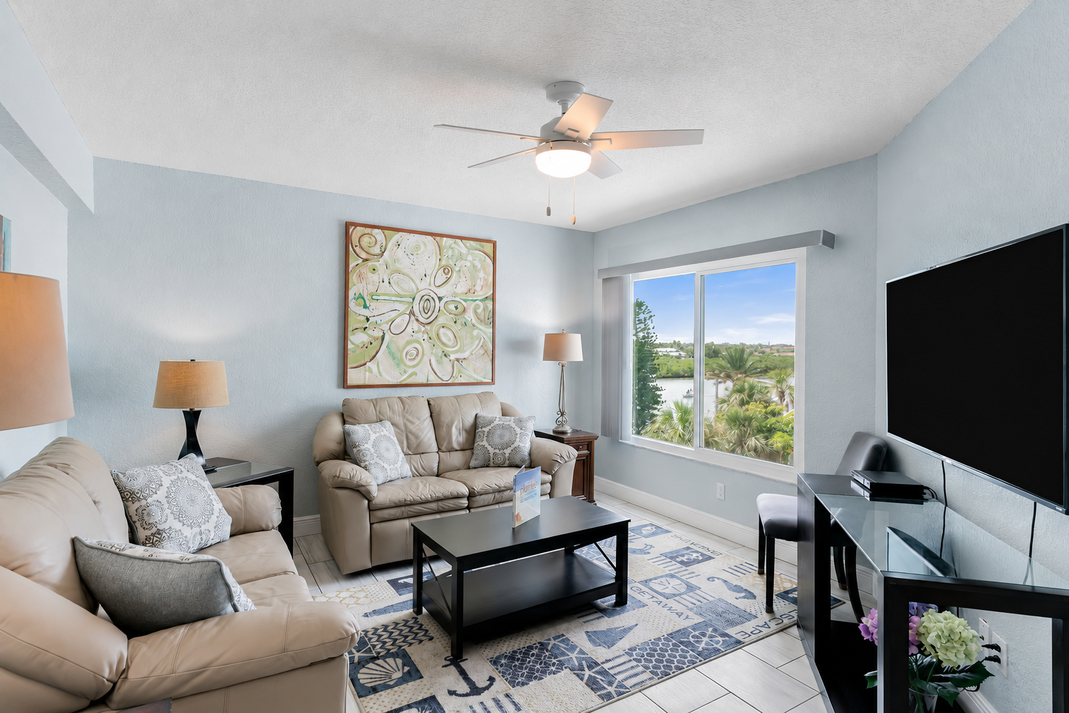 Second living room overlooks the Intracoastal—another comfortable gathering space with a view.