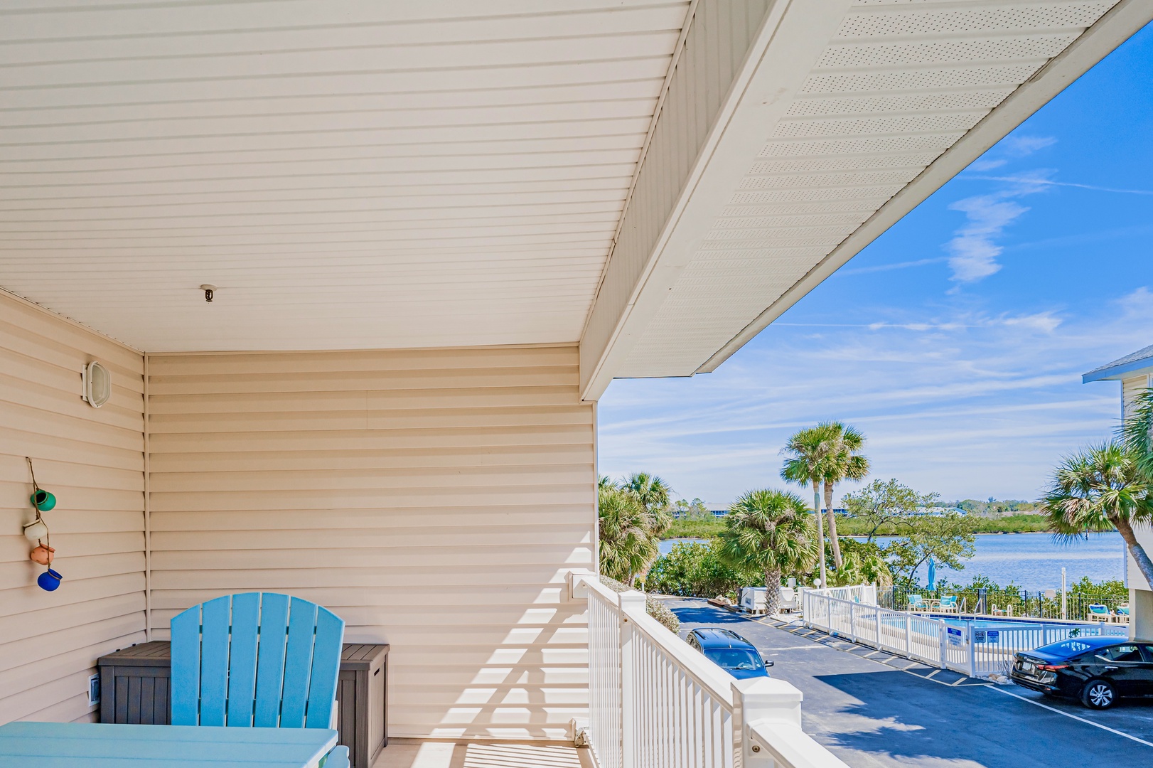 Your private balcony offers peaceful water views with comfortable outdoor seating, perfect for morning coffee or evening relaxation.