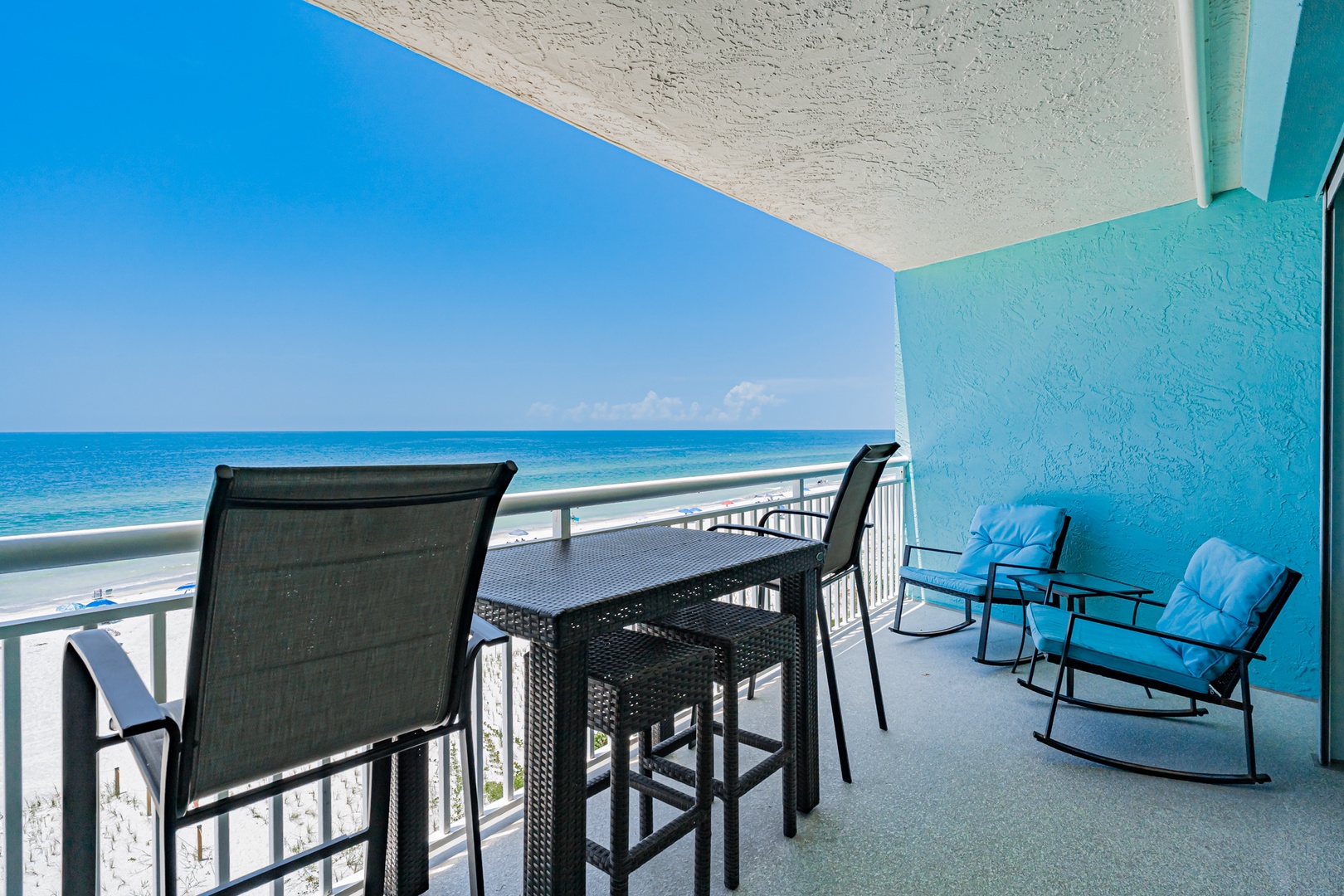 Wake up to the soothing sound of waves and step out onto your private balcony. Sip morning coffee at the high-top table or sink into plush cushioned chairs while the ocean breeze and endless blue horizon invite you to unwind.