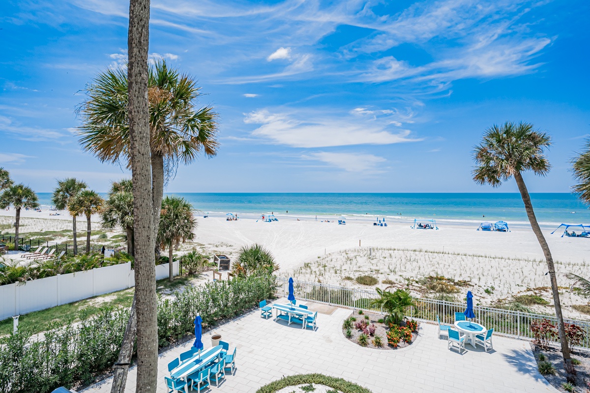 Pristine white sands meet crystal-clear turquoise waters at your doorstep. Relax beneath swaying palms and enjoy direct beach access steps from your vacation retreat.