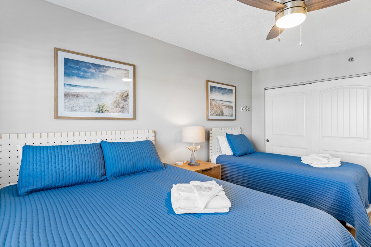 Rest peacefully in your coastal-themed bedroom with 2 Double beds dressed in ocean-blue linens and fresh towels awaiting your arrival.