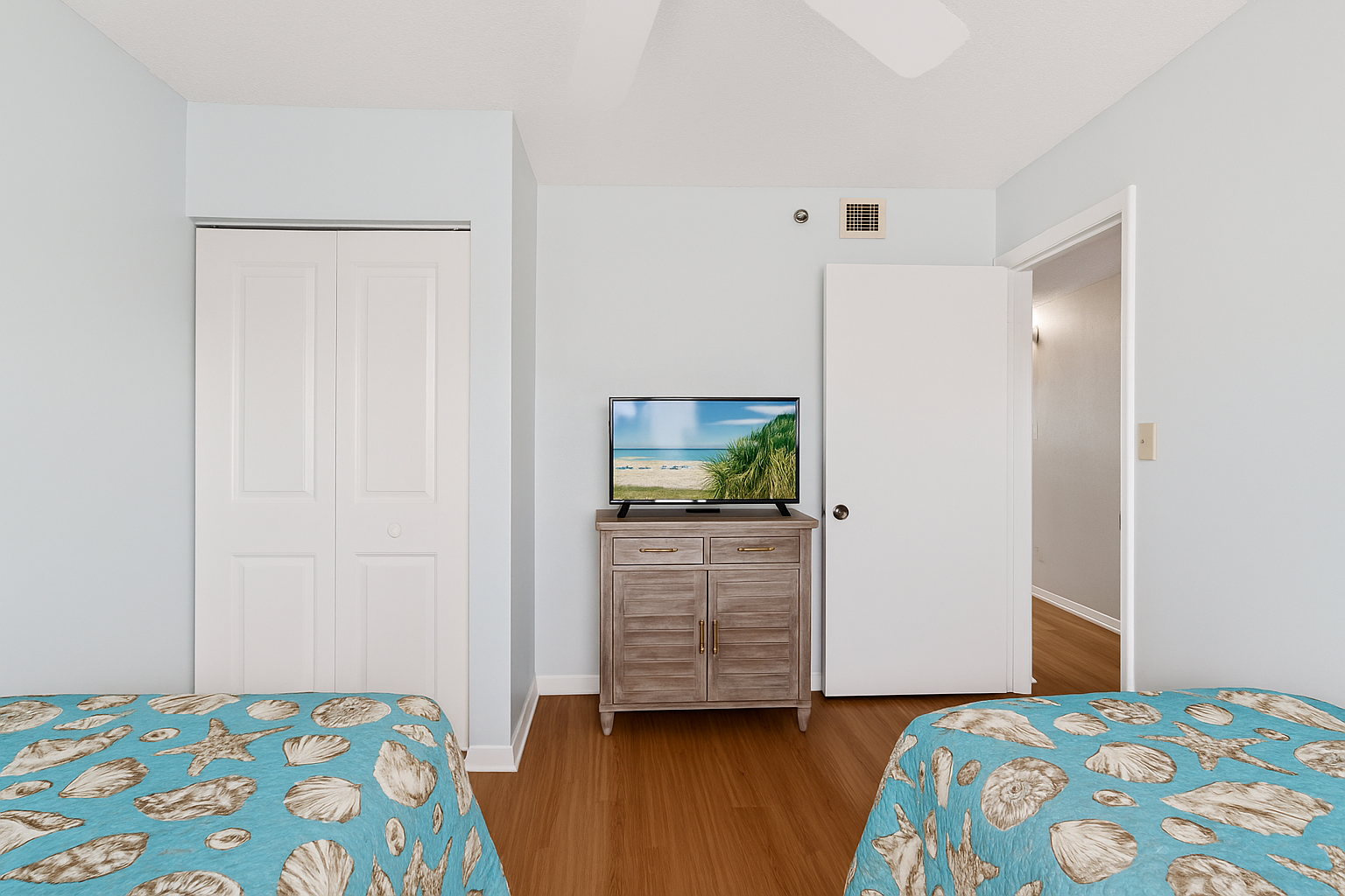 3rd bedroom has smart TV, closet and dresser