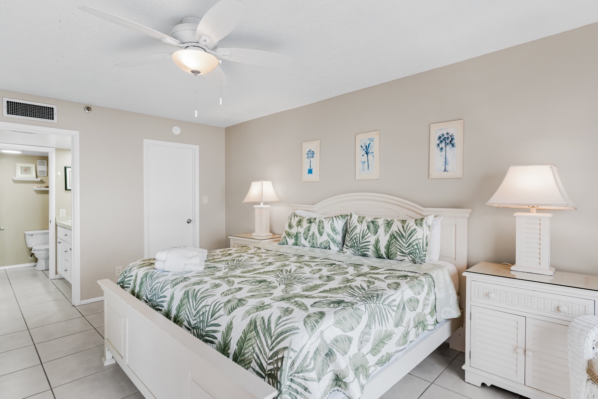 Drift into peaceful sleep surrounded by tropical palm bedding and coastal charm in your bright, airy bedroom retreat.