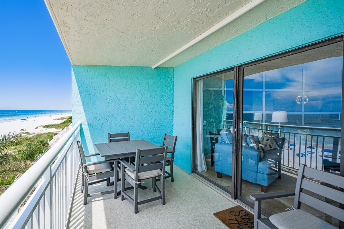 Step onto your private balcony and feel the ocean breeze as you take in sweeping views of sandy shores and sparkling blue waters. Enjoy morning coffee or sunset cocktails at your outdoor dining table, perfectly positioned for beachfront living.
