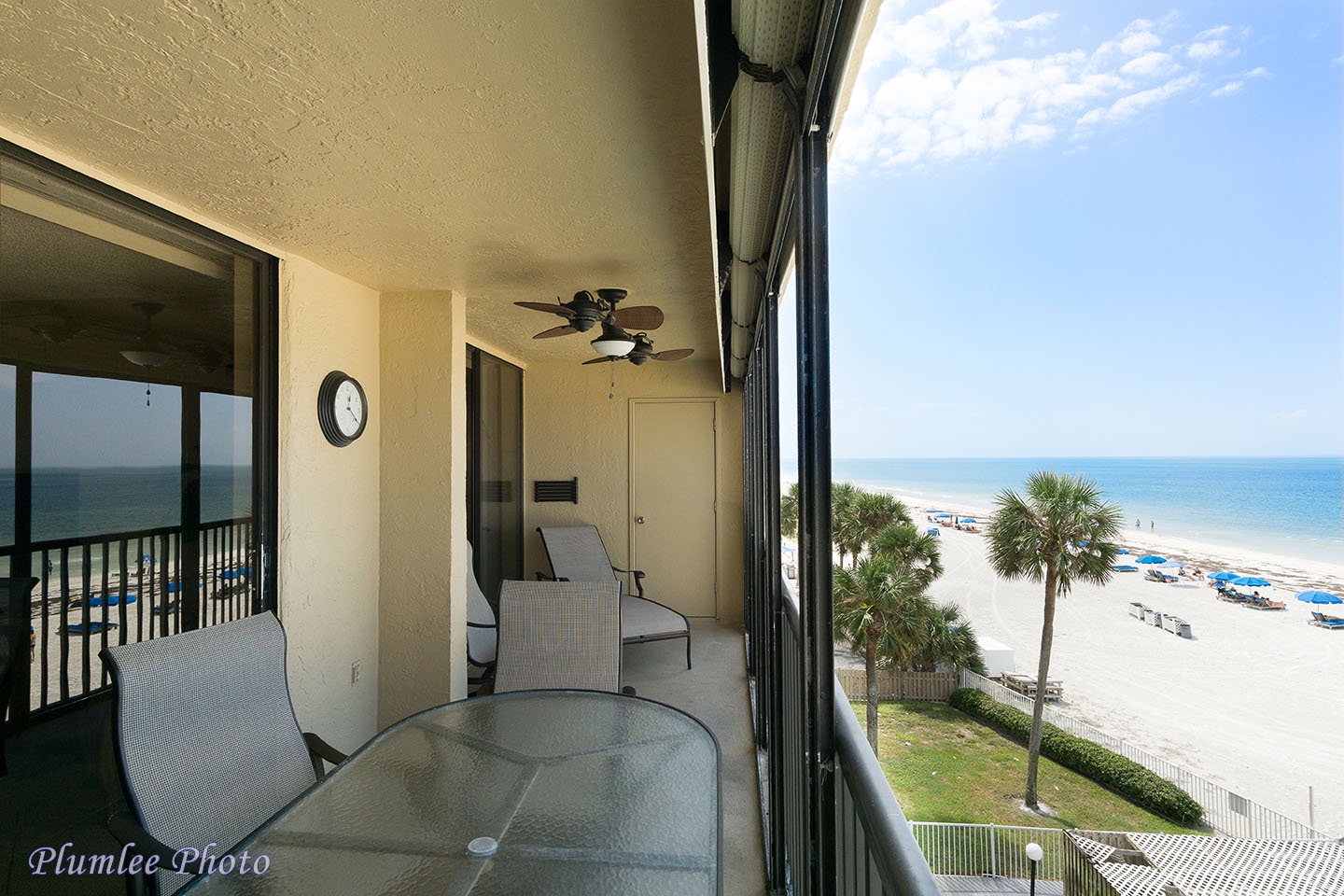 Private balcony with plenty of seating on Gulf