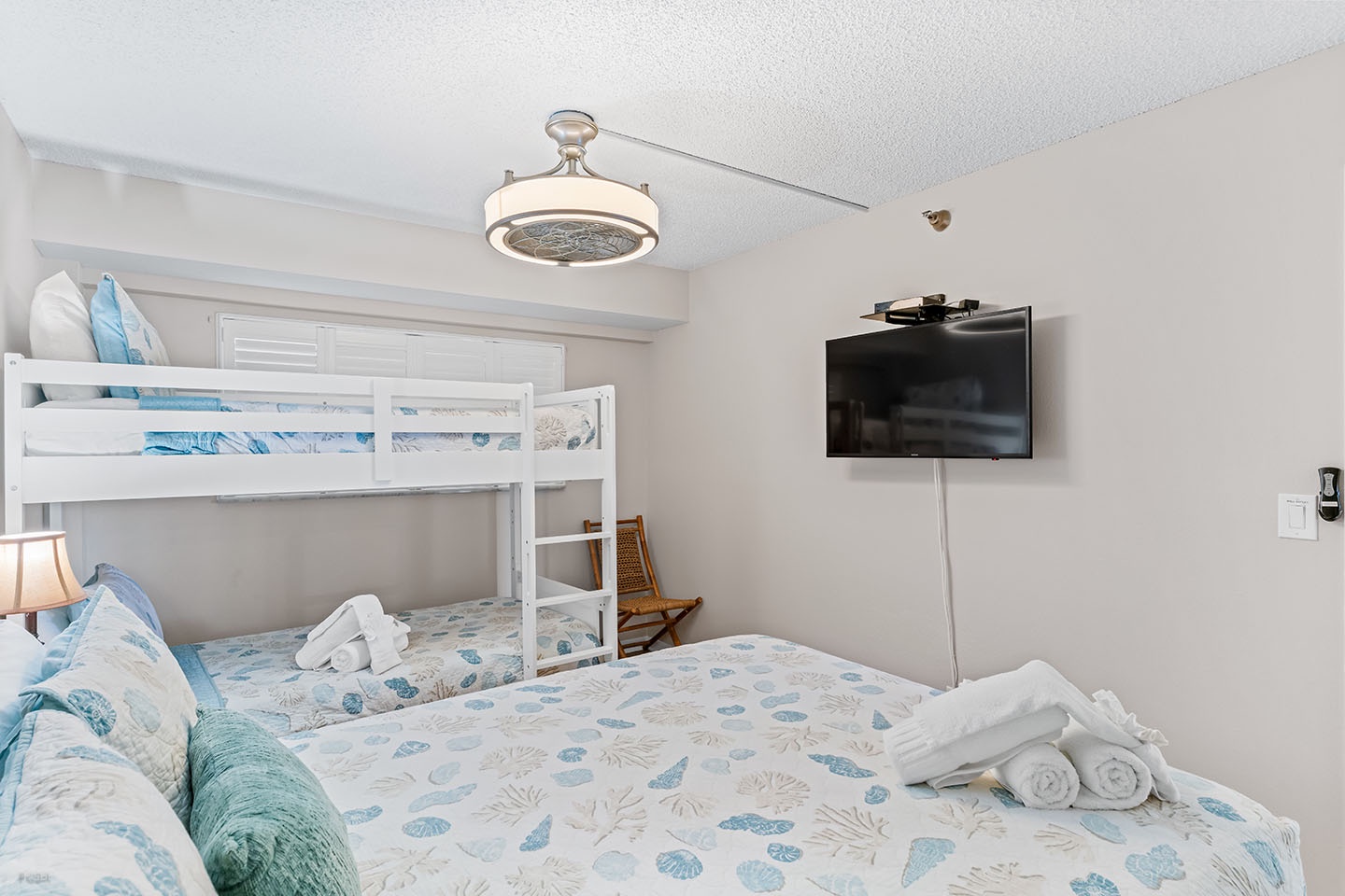 2nd Bedroom has TV and ceiling fan.