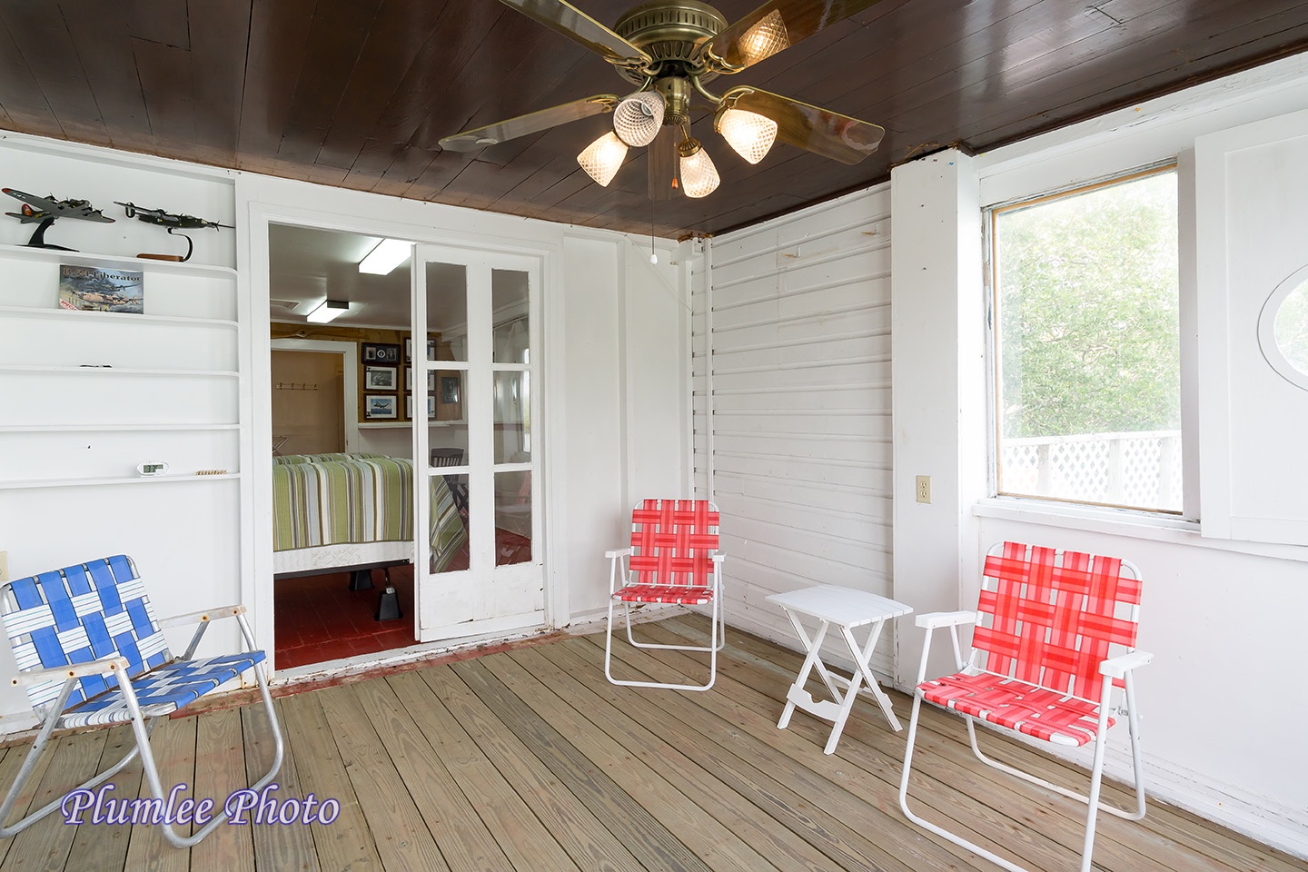1st Floor.  The screened in Porch has overhead fans and is accessible from Bedroom 1.