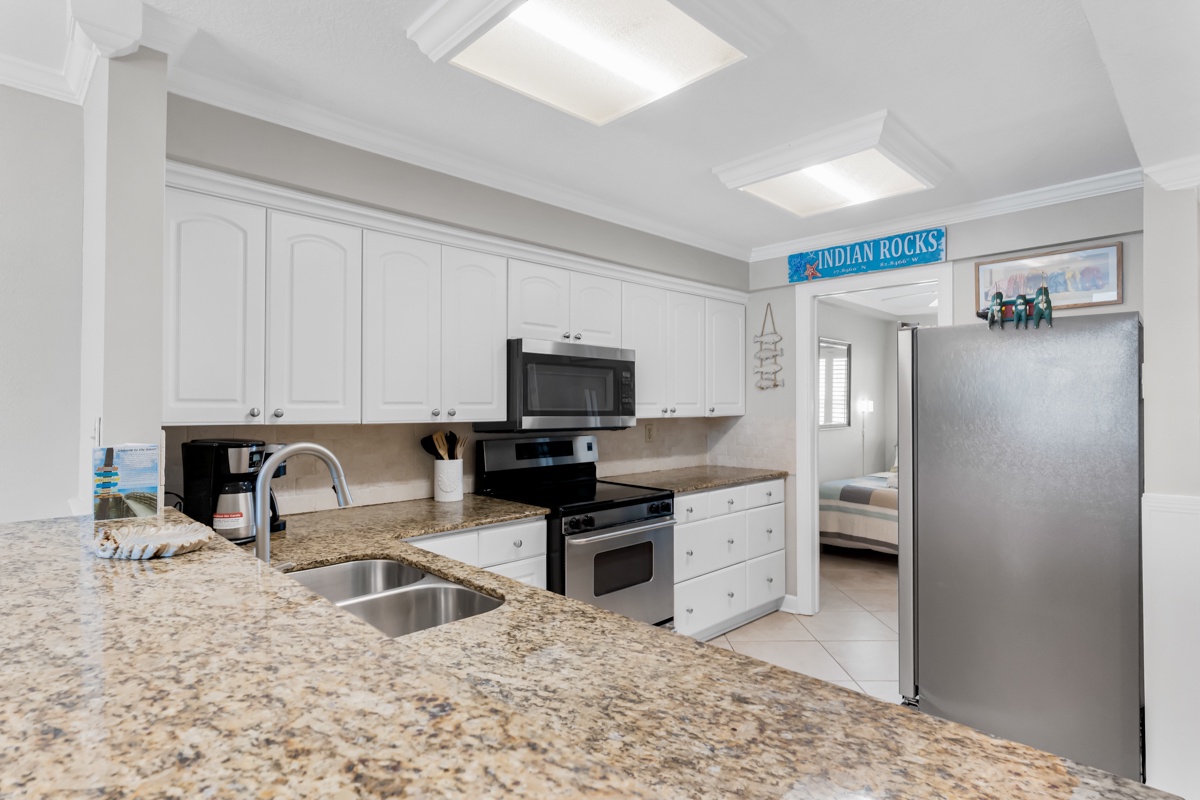 Your fully equipped kitchen features granite countertops, stainless steel appliances, and everything you need to prepare delicious meals during your stay.