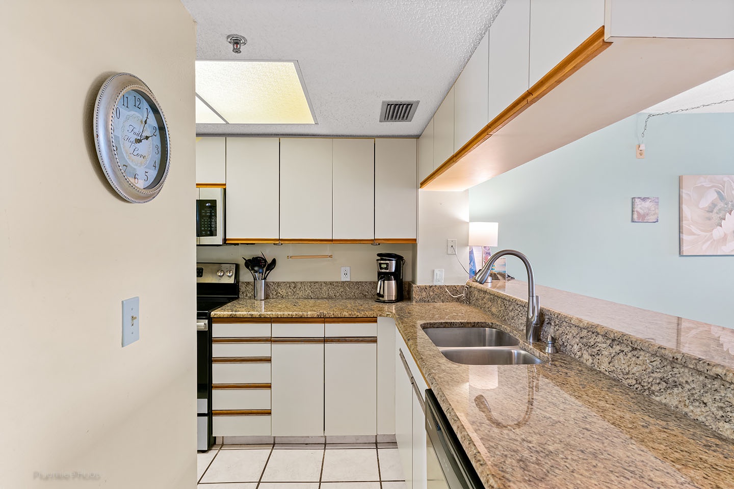 The kitchen is open to the dining area.