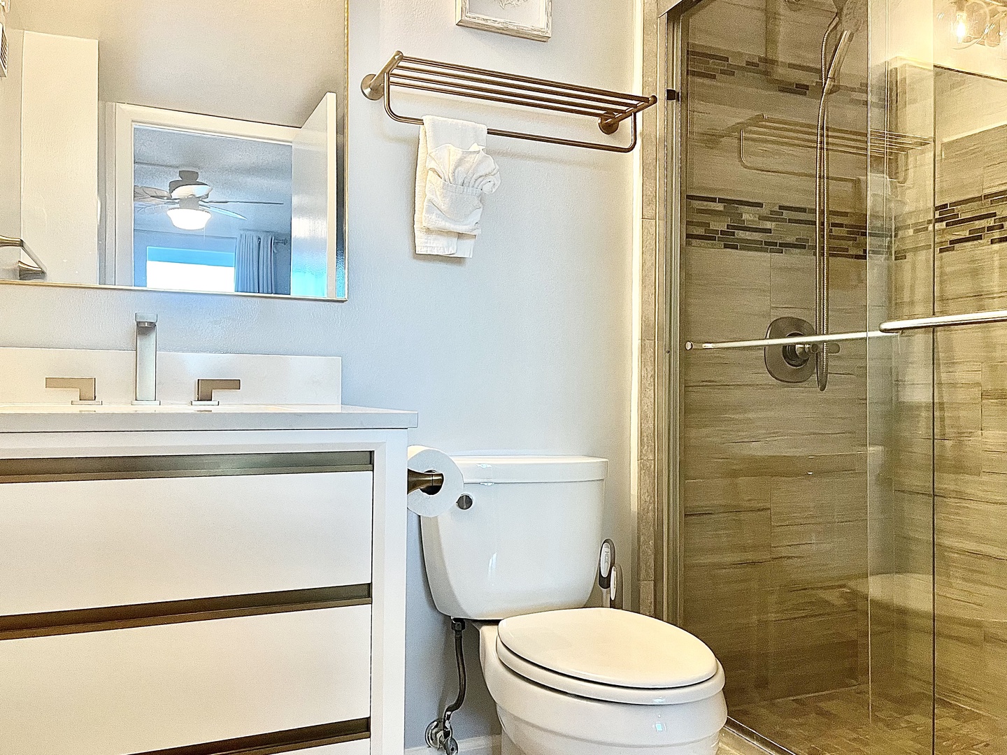 Primary ensuite bathroom with step-in shower