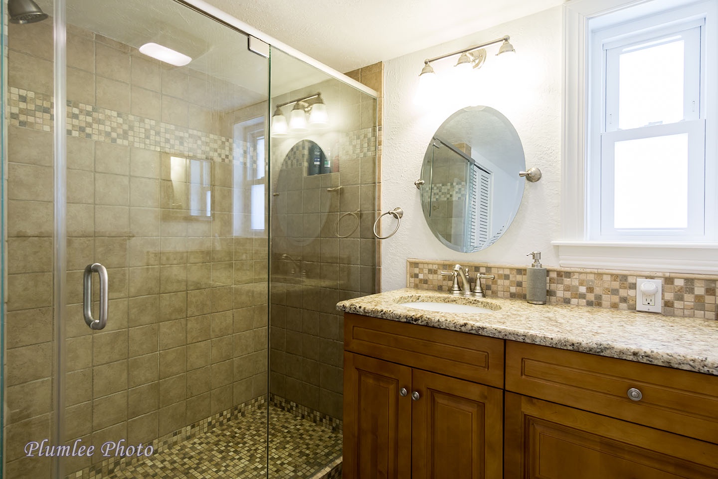 The Hallway Bathroom has a step in shower.