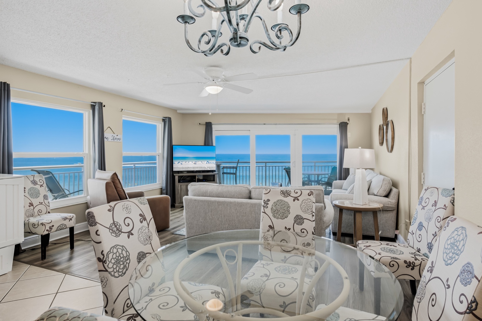 Step into your coastal retreat where stunning ocean views frame every moment. Relax in the spacious living area with elegant furnishings, or enjoy your morning coffee while gazing at the endless blue horizon through expansive windows.