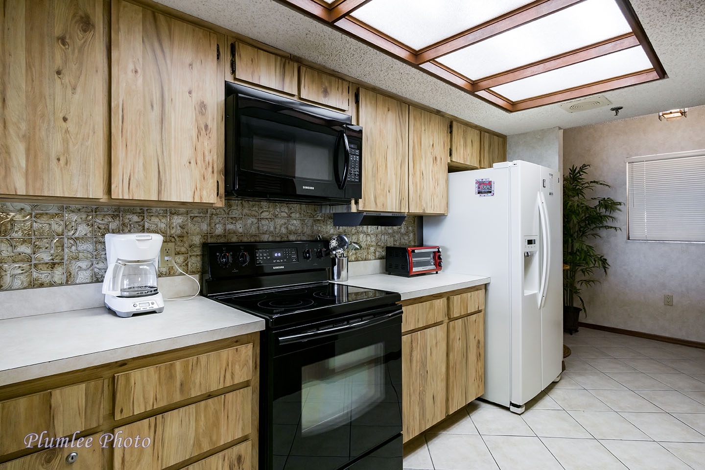 The kitchen has full size appliances.